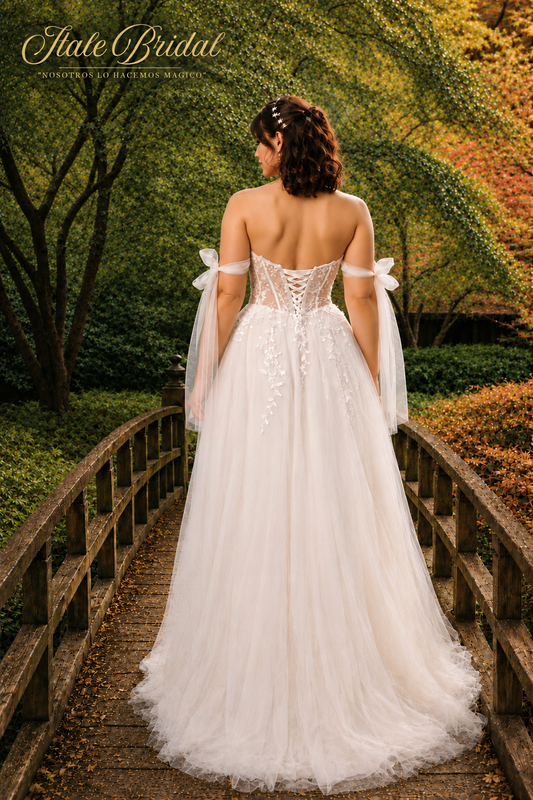 Vestido de novia corte A con corsé con encaje y espalda descubierta con mangas offshoulder y falda de tull vaporosa