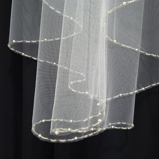 VELO CORTO DOS CAPAS CON MOSTACILLAS Y PERLAS